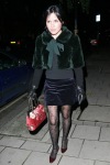 Andrea Corr walking wearing patterned tights