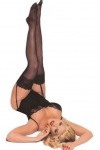 Anna Nicole Smith posing in lingerie and black stockings Anna Nicole Smith posing in lingerie and black stockings