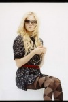 Avril Lavigne wearing fashion tights