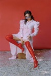 Charli  with red fetish latex boots