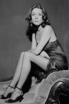 Diana Rigg wearing sheer stockings