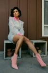 Diane Guerrero wearing pink shoes