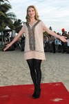 Elizabeth Mitchell on the red carpet in black tights