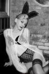 Emily Kinney in lingerie and black stockings