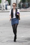 Emma Roberts with coffee and tights