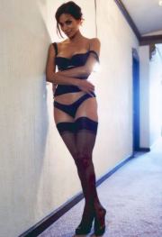 Halle Berry wearing black stockings