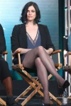 Jessica De Gouw with crossed legs in sheer tights