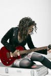 Katie Melua playing guitar