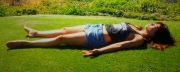 Kristin Kreuk on the grass