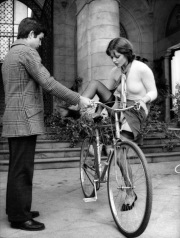 Laura Antonelli riding a bicycle