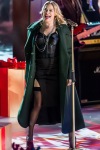 LeAnn Rimes on stage with a dress and black stockings LeAnn Rimes on stage with a dress and black stockings