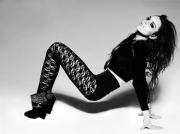 Lindsay Lohan wearing black pattern pantyhose