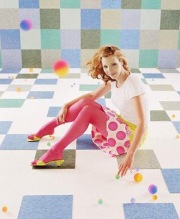 Lisa Kudrow wearing pink tights
