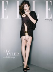 Liv Tyler posing her legs for Elle Magazine