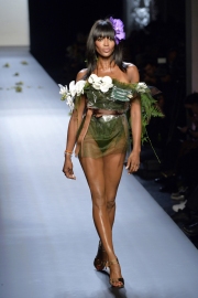 Naomi Campbell wearing a green dress for Gaultier