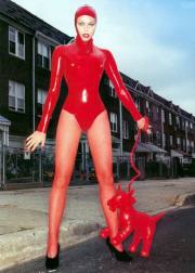 peta Wilson in red, fetish dress