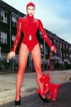 peta Wilson in red, fetish dress