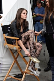 Willa Holland wearing patterned pantyhose