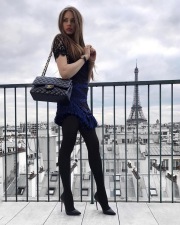 Xenia Tchoumi in Paris wearing miniskirt and pantyhose