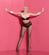 Miley Cyrus in black pantyhose