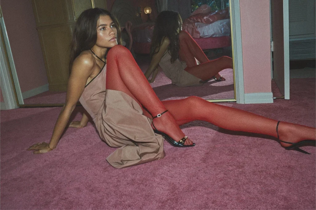Zendaya wearing red fishnet tights